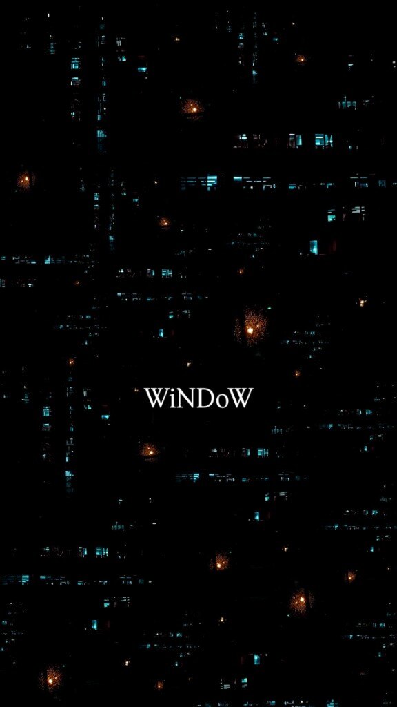 A night city, the word Window set among distant lights